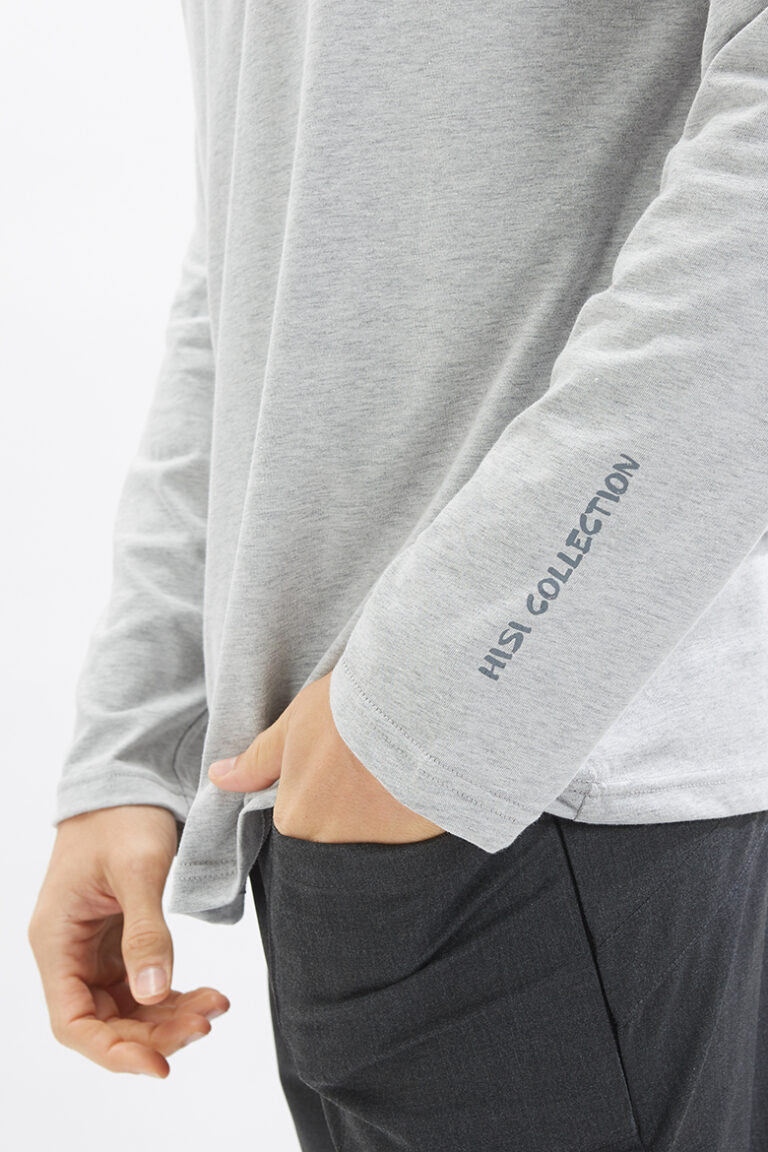Pormenor da manga da long sleeve personalizada com a marca hisi collection fabricada pela Unifardas